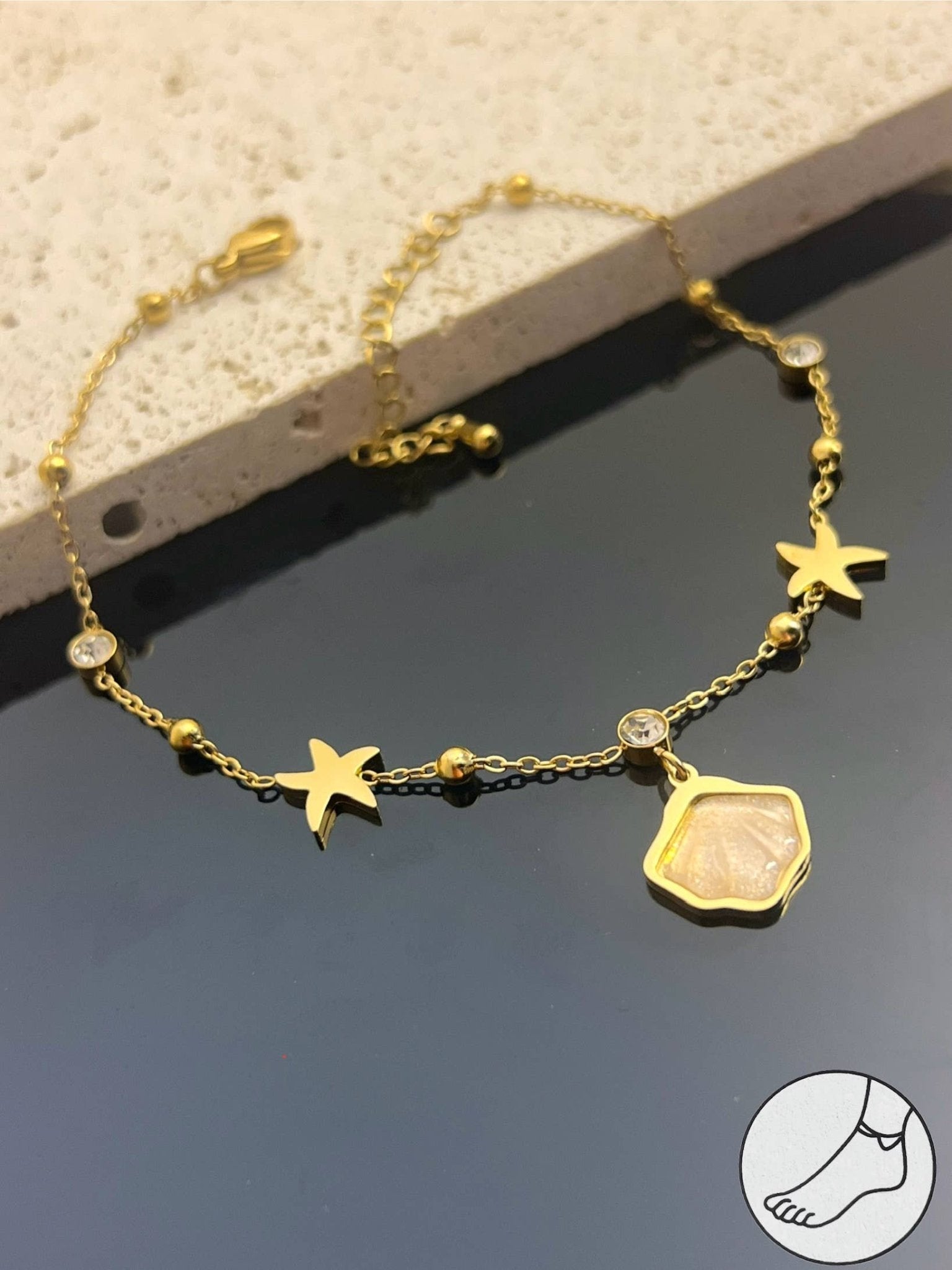 Chaîne de cheville Étoile & Coquillage en acier inoxydable - Bijoux Bravo